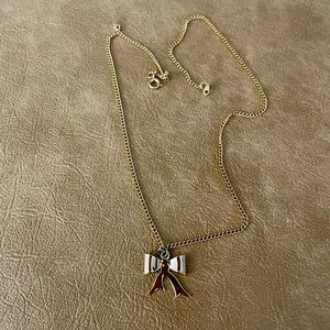 Simple gold necklace with garnet